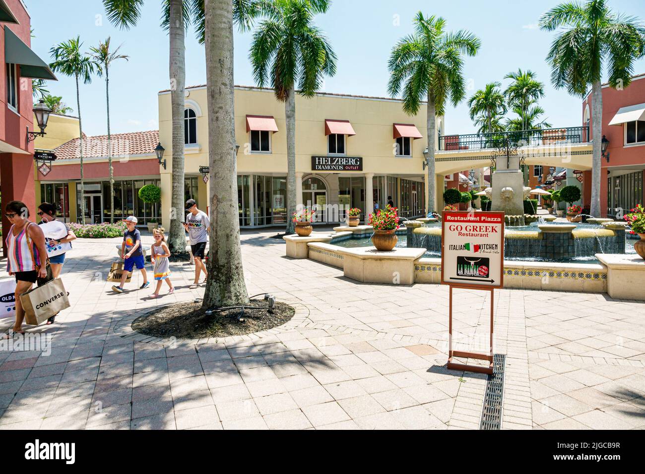 Estero Florida,Miromar Outlet factory outlets designer name brand shopping mall fountain family Stock Photo