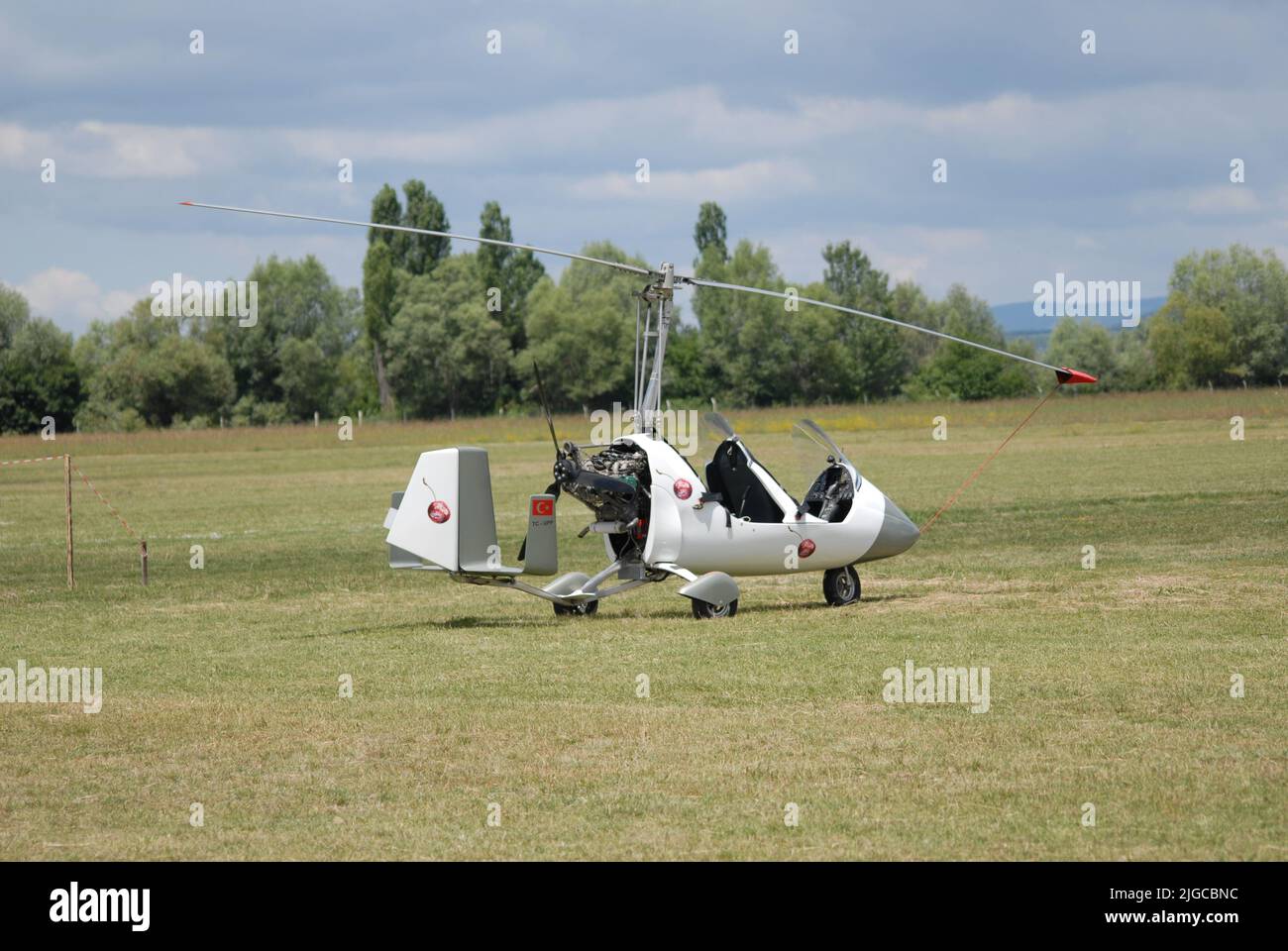 Eskişehir, Türkiye – June 26, 2022: The gyrocopter parked on the grass airstrip performed public flights at the THK İnönü. Stock Photo