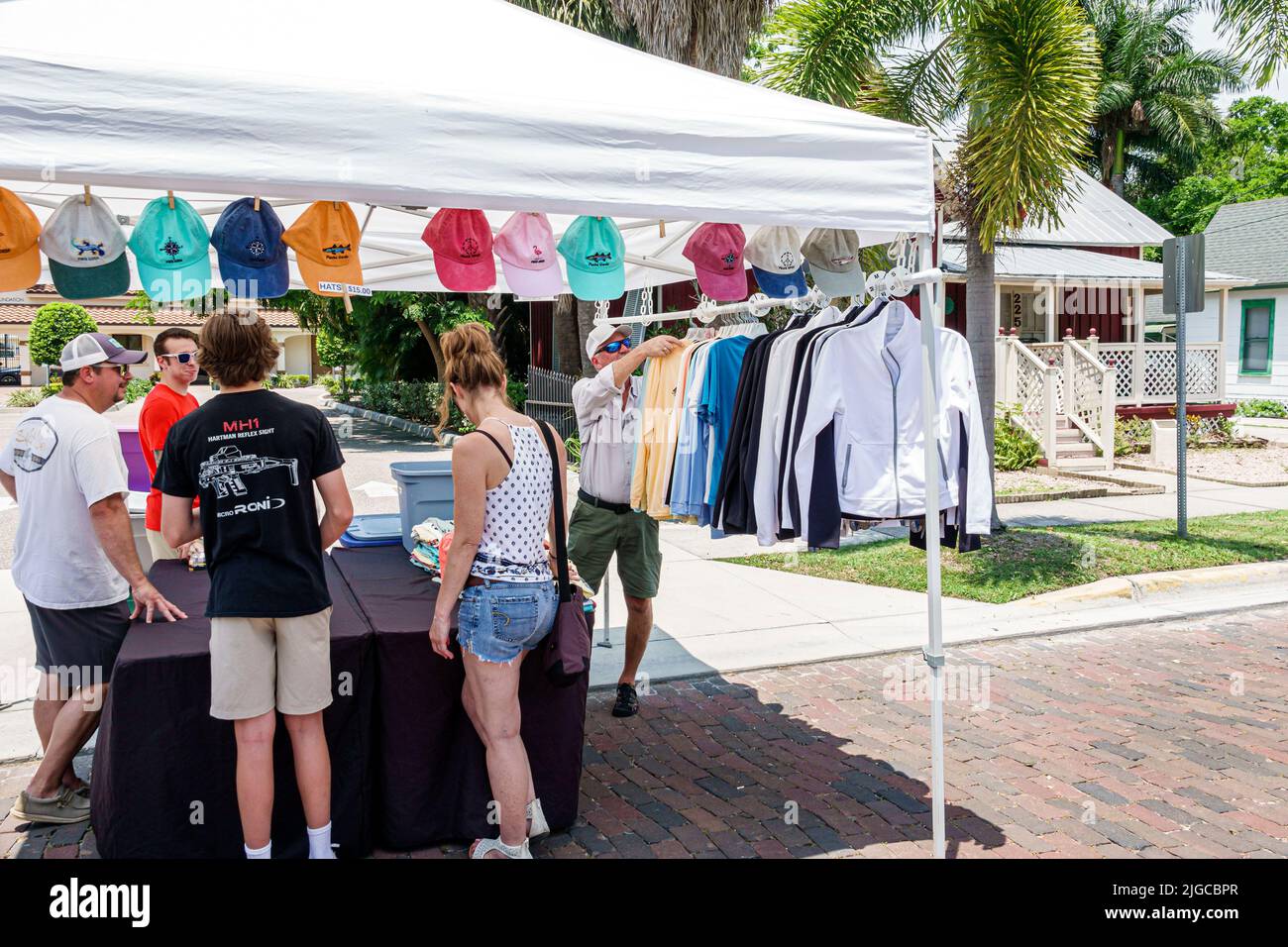 Punta Gorda Florida,Historic District farmers farmer's market vendor clothing hats caps shopping family Stock Photo