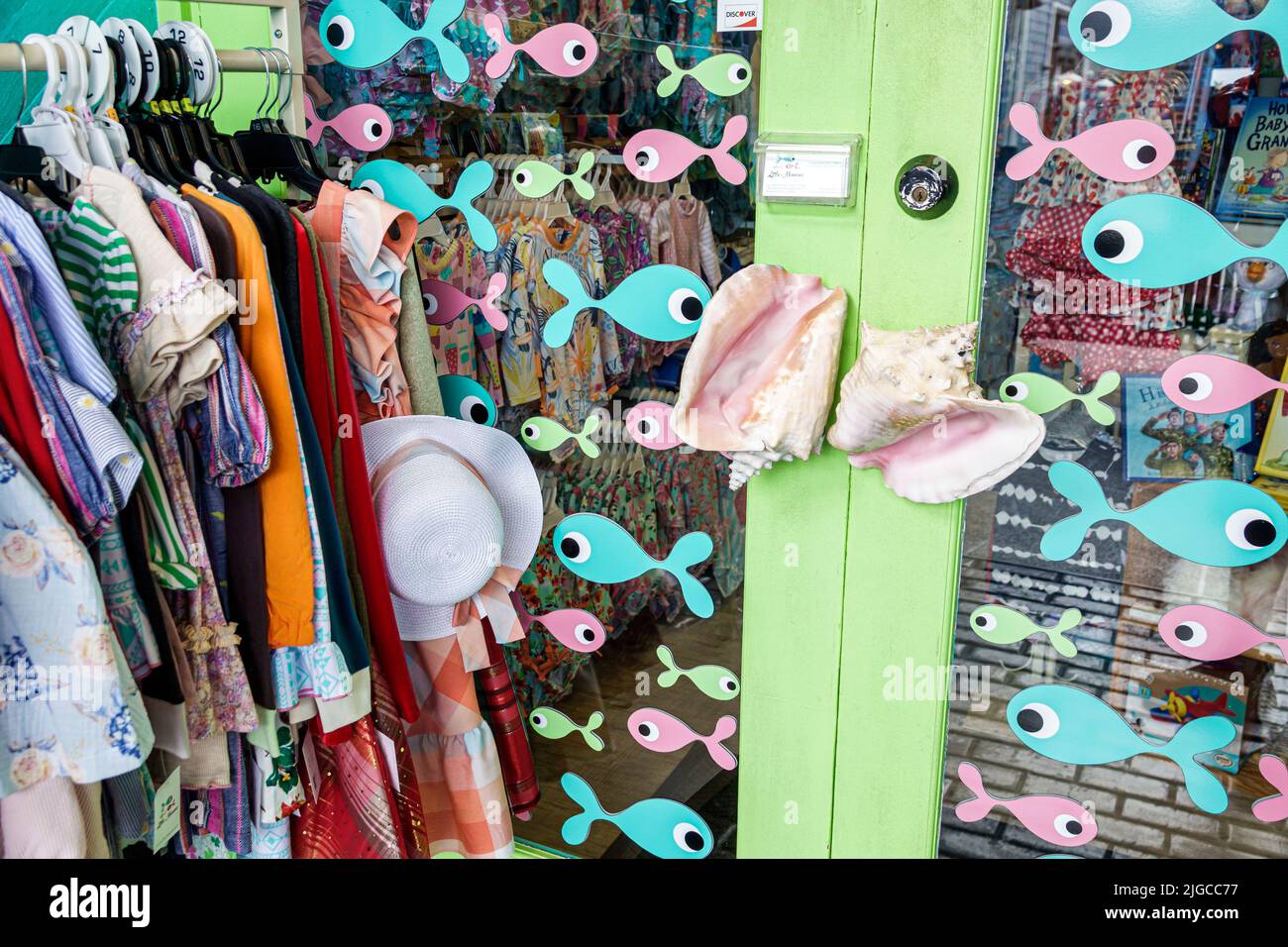 Punta Gorda Florida,Fishermen's Village shopping dining complex,Little-Minnows children’s clothing store entrance seashell door handles Stock Photo