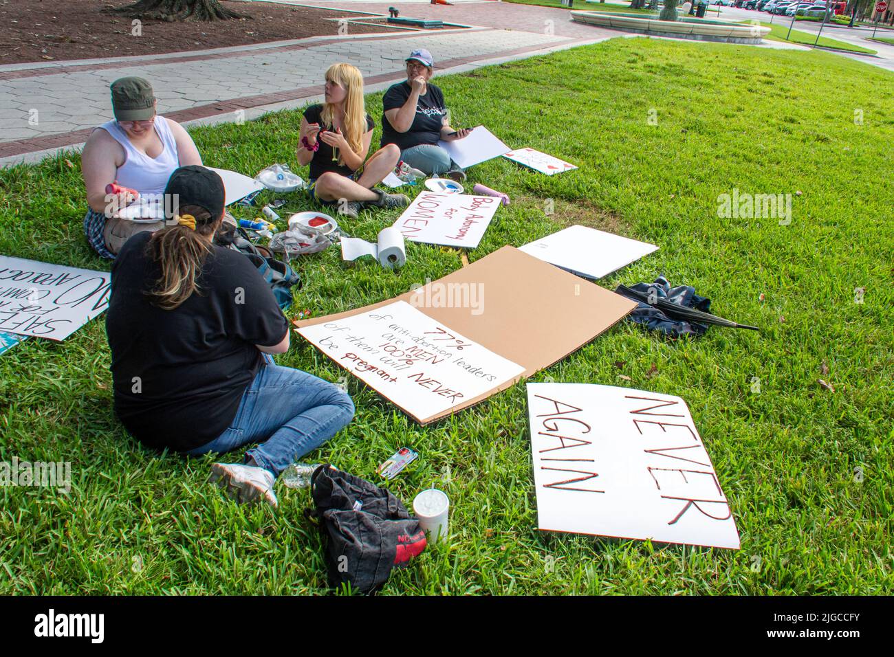 Young pro-abortion activists are preparing their placards for the demonstration march against restrictions imposed in many states. Stock Photo