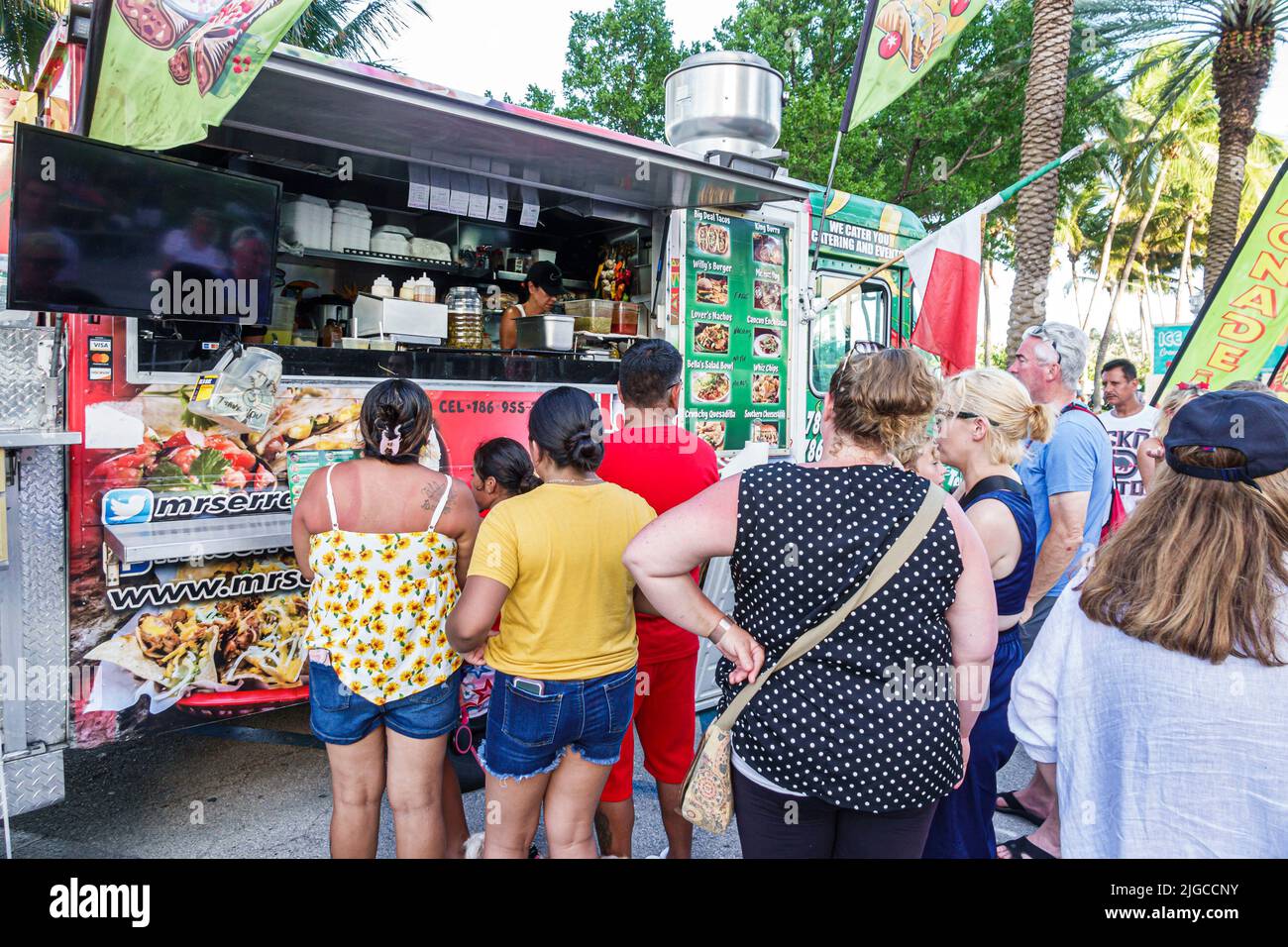 Miami Beach Florida,Ocean Terrace Fire on the Fourth 4th of July Festival event celebration,food truck line queue customers men women family waiting Stock Photo