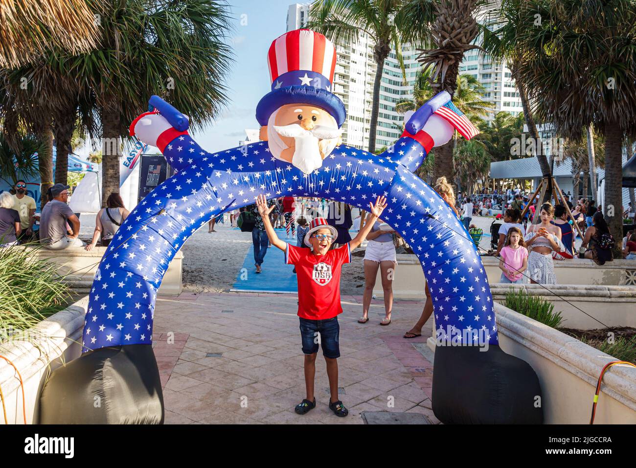 Miami Beach Florida,Ocean Terrace Fire on the Fourth 4th of July Festival event celebration,Uncle Sam arch archway Hispanic boy posing Stock Photo