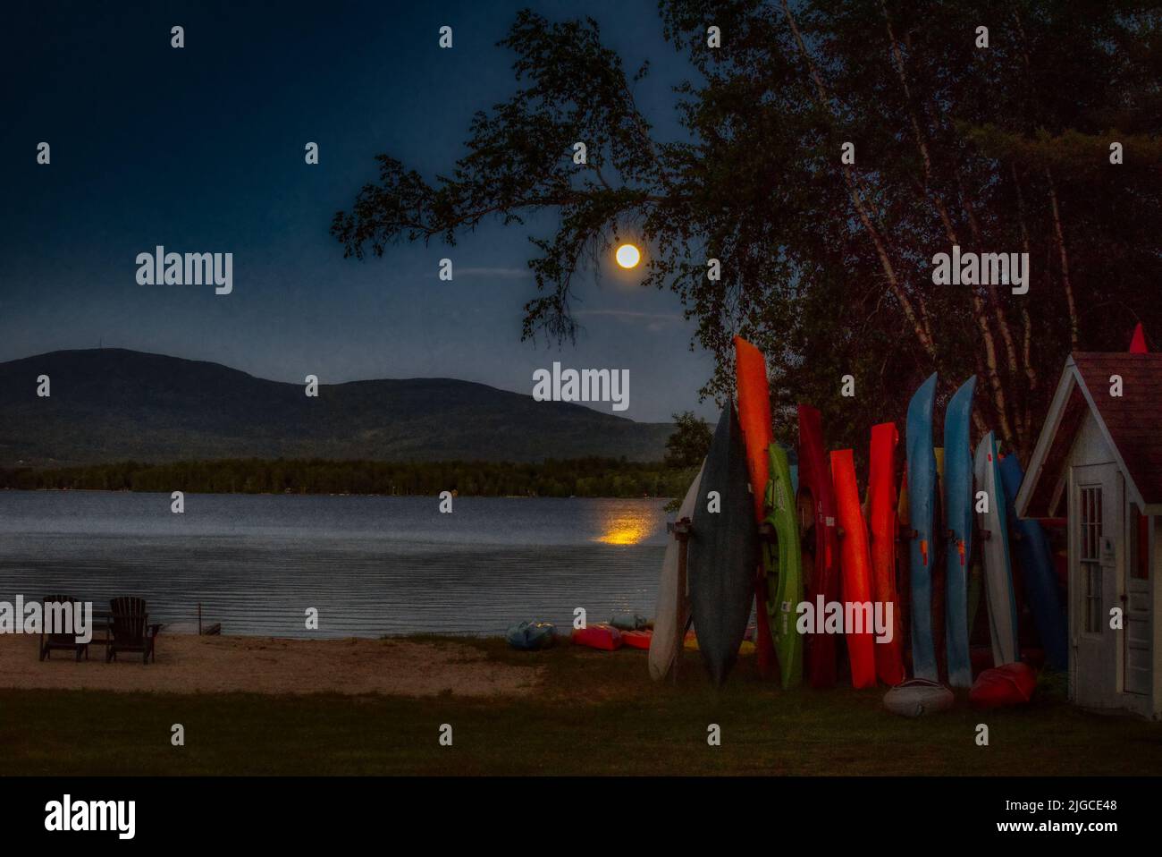 Full moon rising over Mt. Kersarge, Pleasant Lake, New London, NH. Site