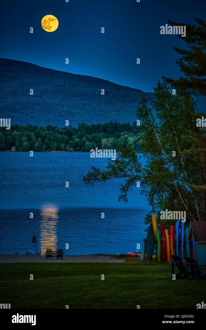 Full moon rising over Mt. Kersarge, Pleasant Lake, New London, NH. Site