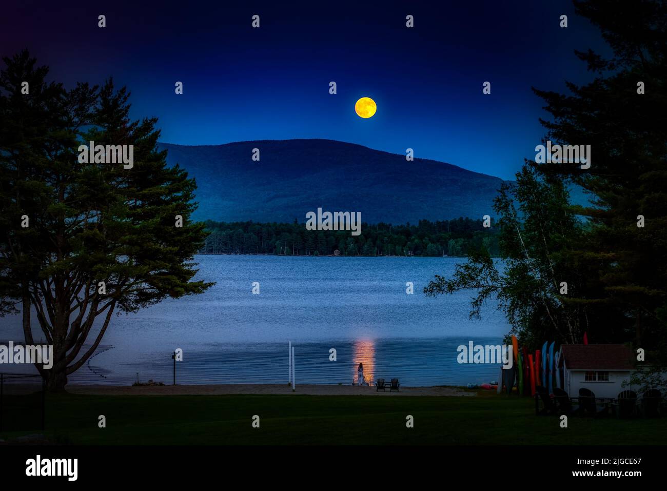 Full moon rising over Mt. Kersarge, Pleasant Lake, New London, NH. Site