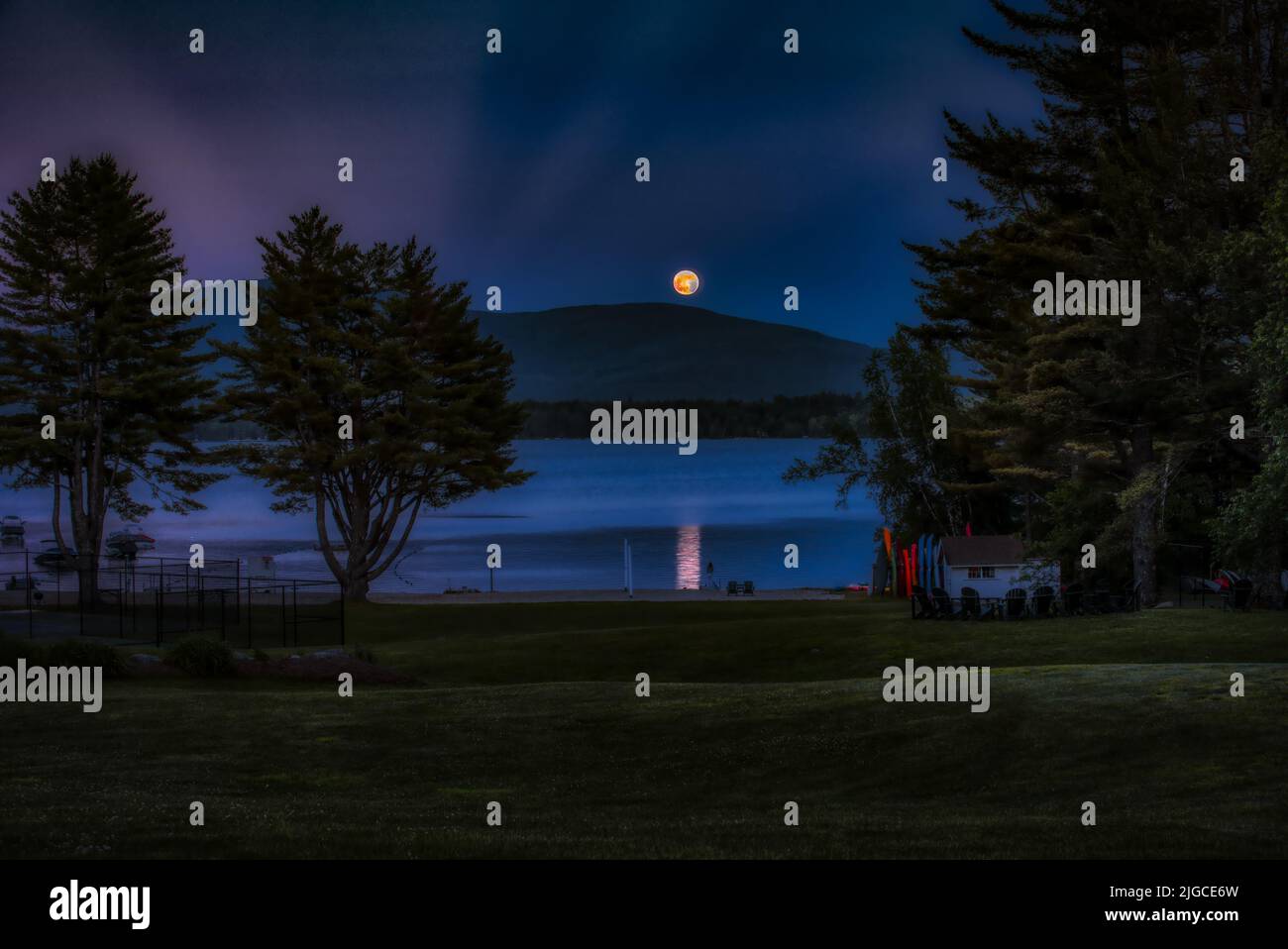 Full moon rising over Mt. Kersarge, Pleasant Lake, New London, NH. Site