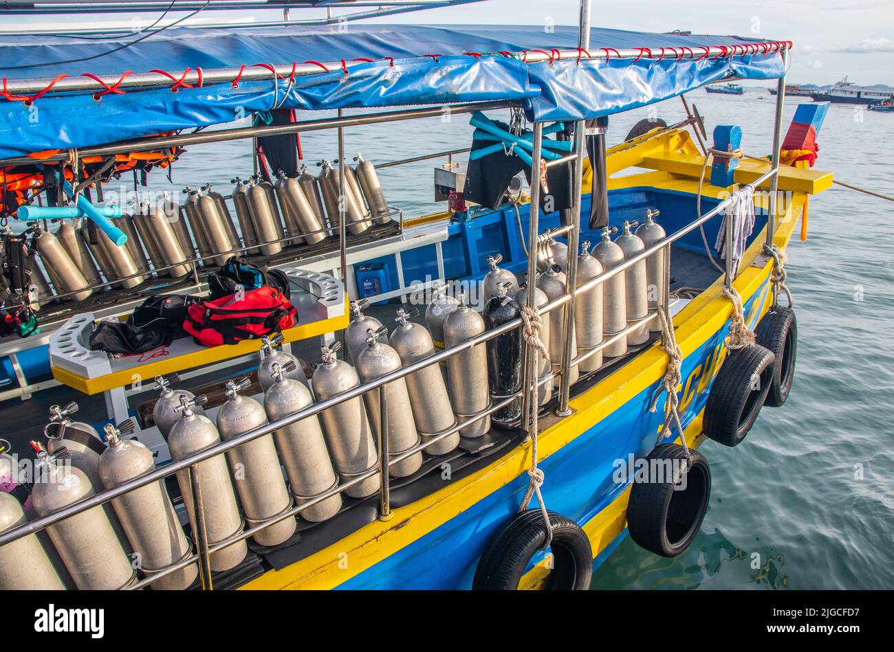 Divers oxygen tanks on a deck of an excursion ship Stock Photo - Alamy