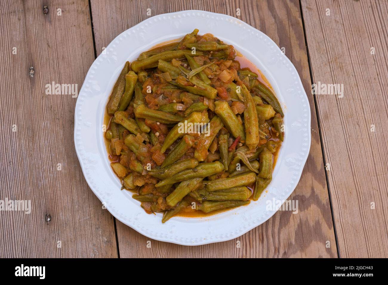 Okra in the pot, favorite traditional Greek food Stock Photo Alamy