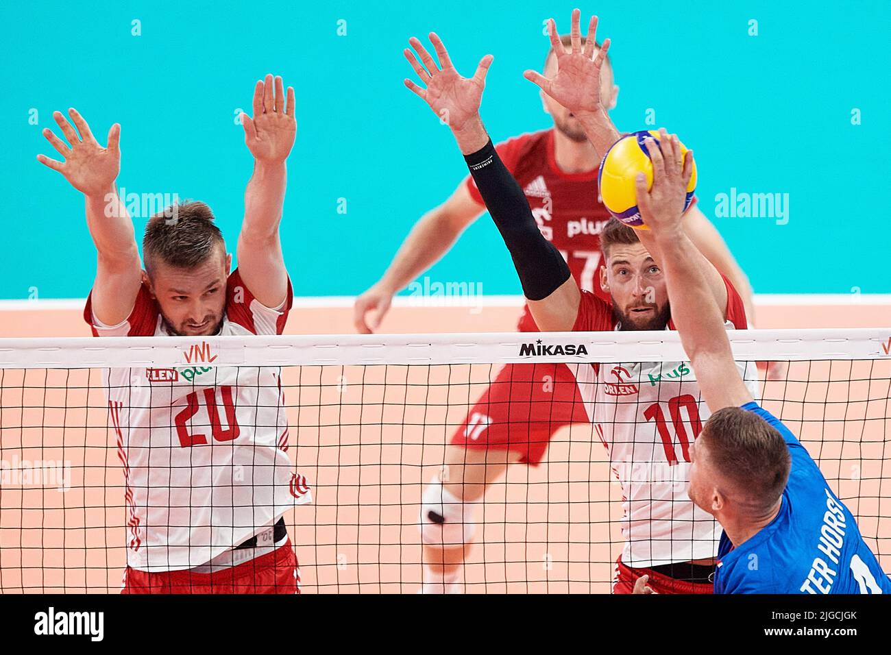 Gdansk, Poland. 09th July, 2022. Mateusz Bieniek (L) and Bartosz Bednorz (2R) of Poland and Thijs Ter Horst (R) of the Netherlands during the 2022 men's FIVB Volleyball Nations League match between Poland and the Netherlands in Gdansk, Poland, 09 July 2022. Credit: PAP/Alamy Live News Stock Photo