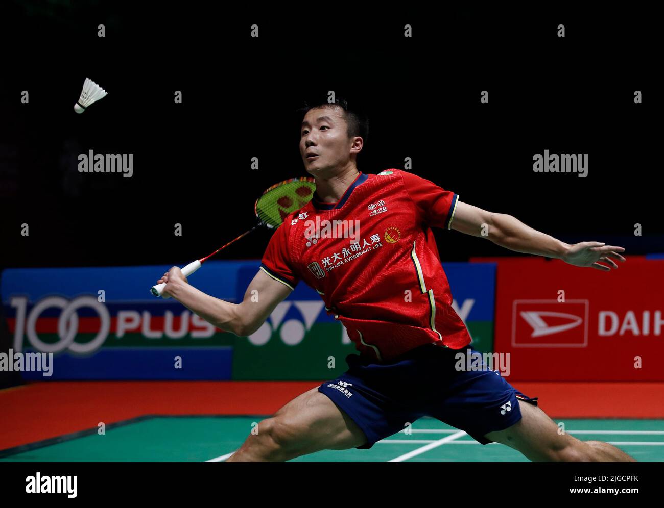Lu Guang Zu of China competes against Chico Aura Dwi Wardoyo of Indonesia during the Mens Single semi-finals match of the Perodua Malaysia Masters 2022 at Axiata Arena, Bukit Jalil