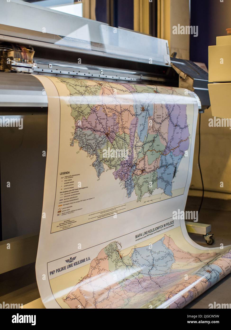 Printing the maps of railway connections in Poland, Eastern Europe Stock Photo