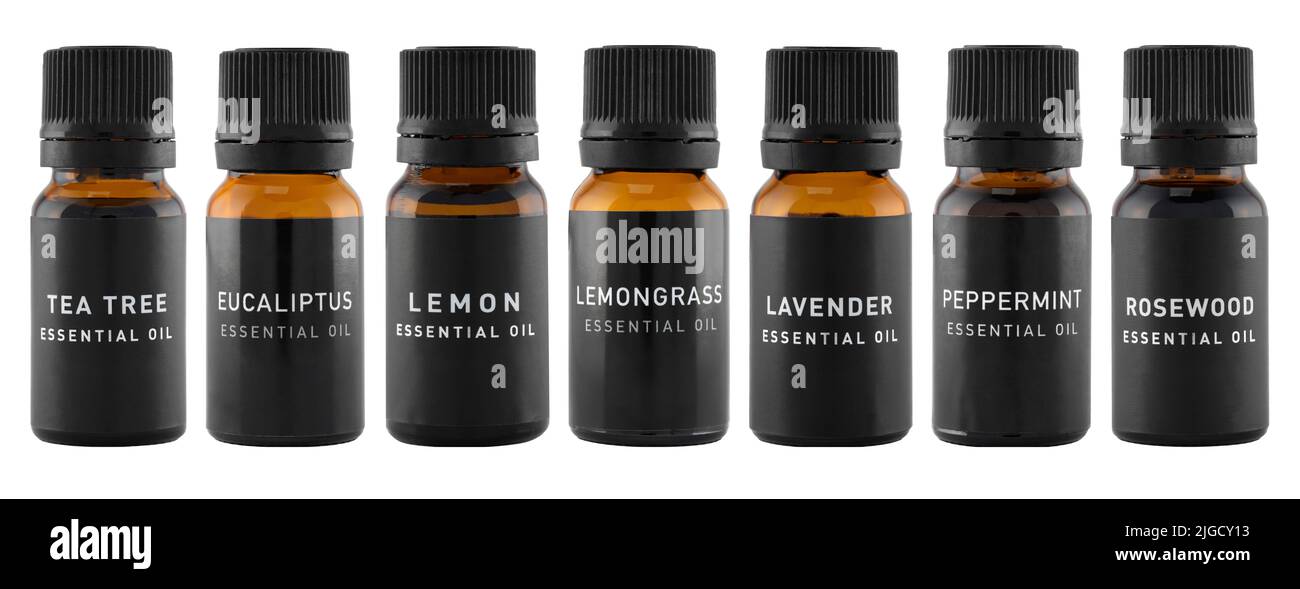 Set of essential oil bottles isolated on a white. Lavender, lemongrass, lemon, peppermint, rosewood, tea tree and eucalyptus oils. Natural cosmetic Stock Photo