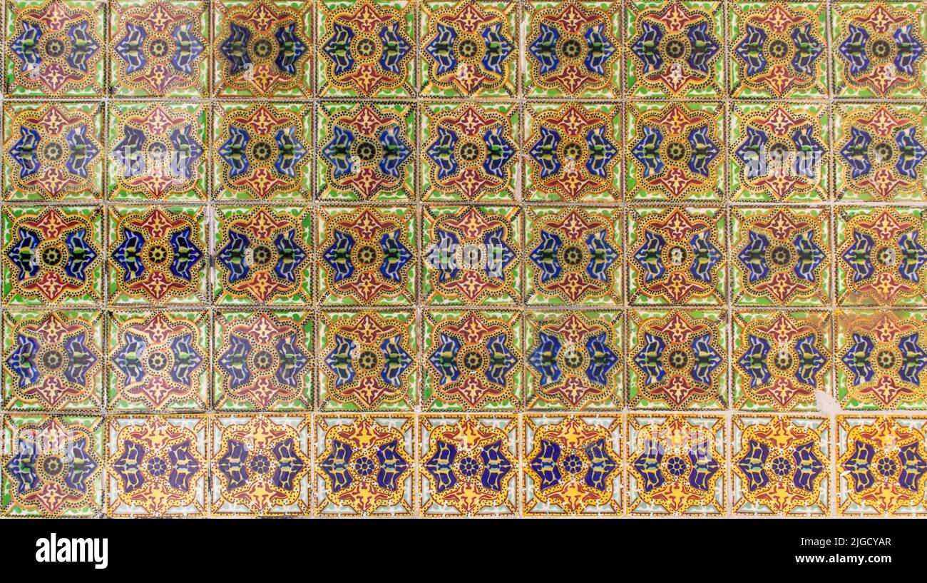 rare green yellow red and blue talavera poblana tiles texture backgorund of a traditional mexican wall Stock Photo
