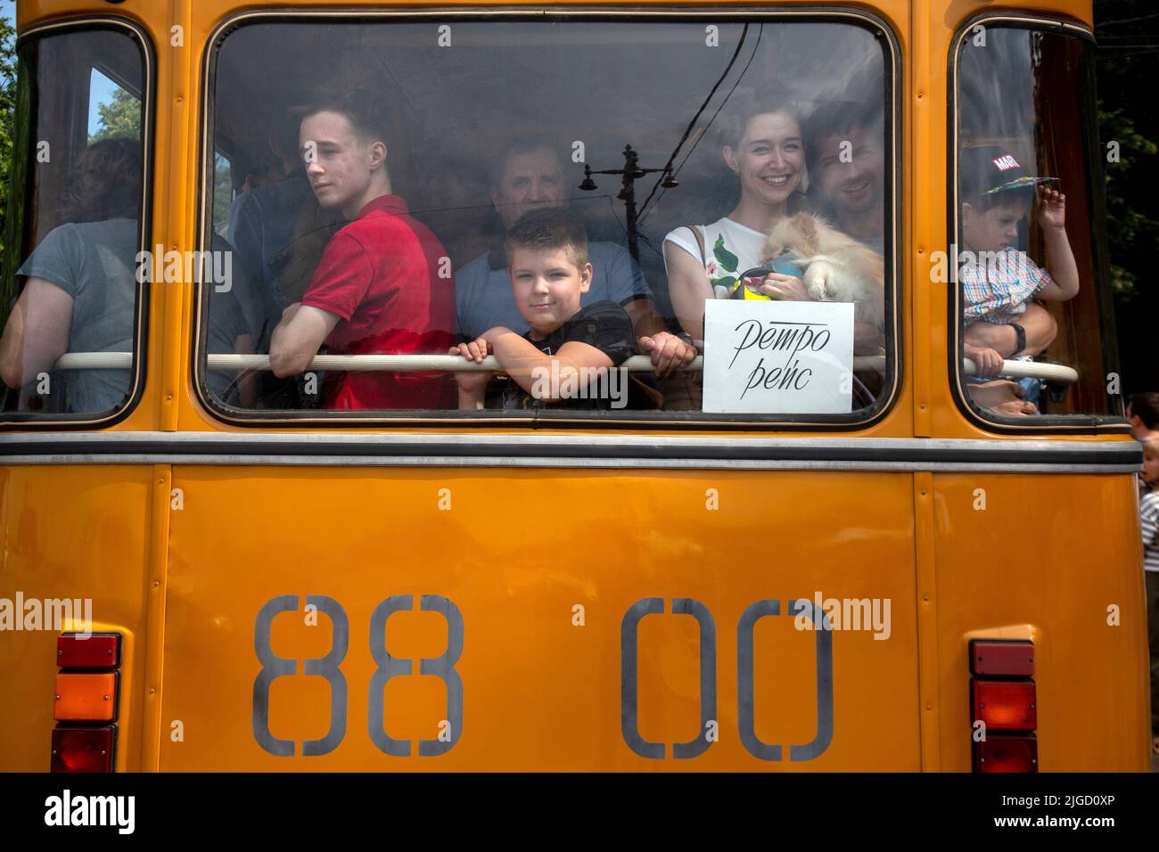 Moscow, Russia. 9th of July, 2022. People ride an old Soviet bus LiAZ-677 to a classic car festival on Moscow's Sparrow Hills during  celebration the Moscow Transport Day in Moscow, Russia. Nikolay Vinokurov/Alamy Live News Stock Photo