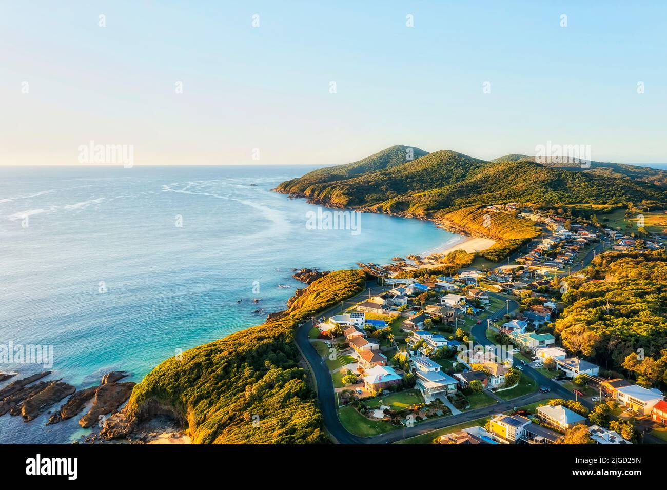 Burgess beach in Forster coastal town of regional NSW in Australia at sunrise aerial scenic