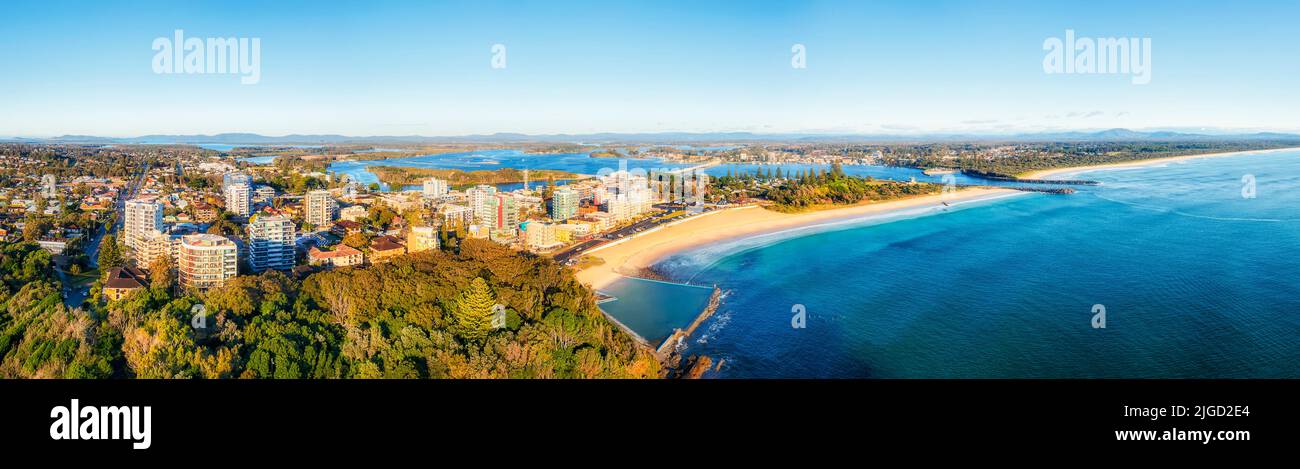 Second head to Nine Mile beach over Forstrer beach and river mouth in aerial panorama of Forster Tuncurry towns, Australia. Stock Photo