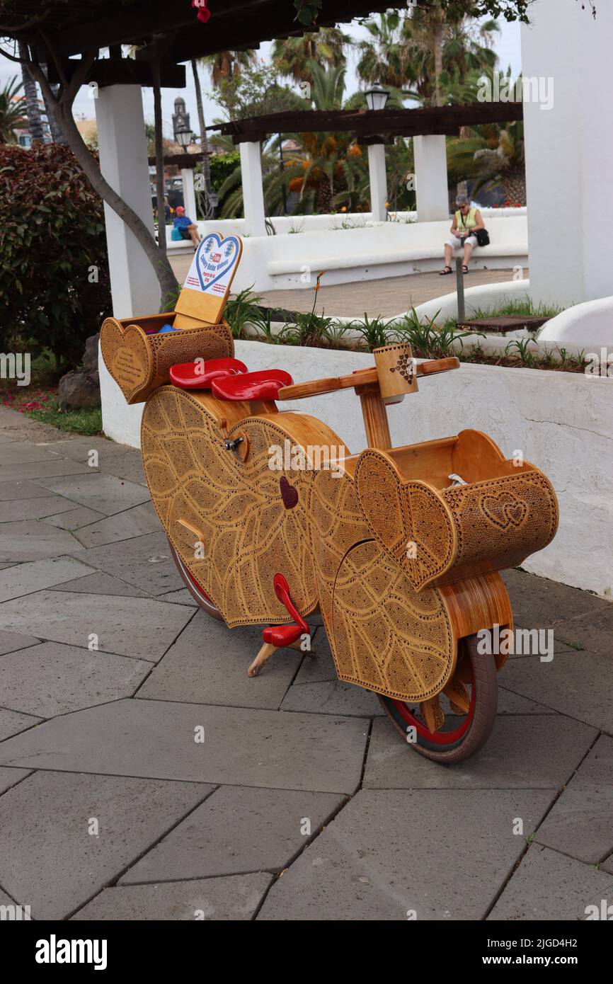 One example of a wooden bicycle made by Milos Smilnak, on display at Avenue de Cristobal Colóne, Puerto de la Cruz, Tenerife. Stock Photo