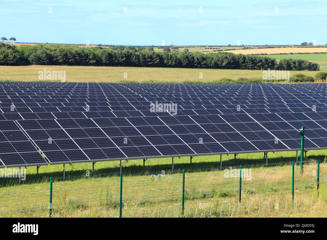Solar Farm, panels, in rural landscape, green, energy, solar, panels,Thornham, Norfolk, England Stock Photo