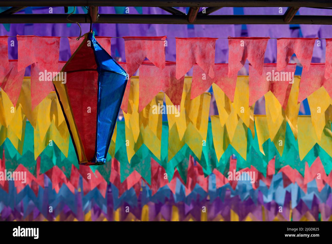 decorative balloon and colorful flags of decoration of festa junina in brazil Stock Photo