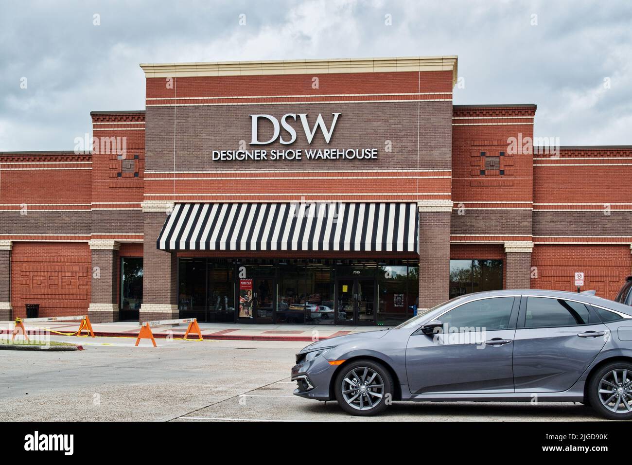 Houston, Texas USA 12-05-2021: DSW Designer Shoe Warehouse building exterior and parking lot in Houston, TX. Stock Photo