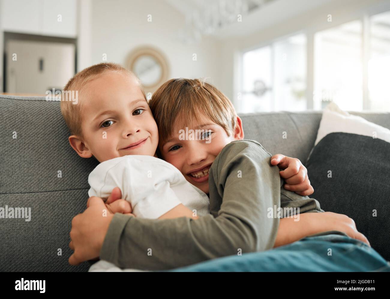 I have a best friend for life. two little brothers hugging each other