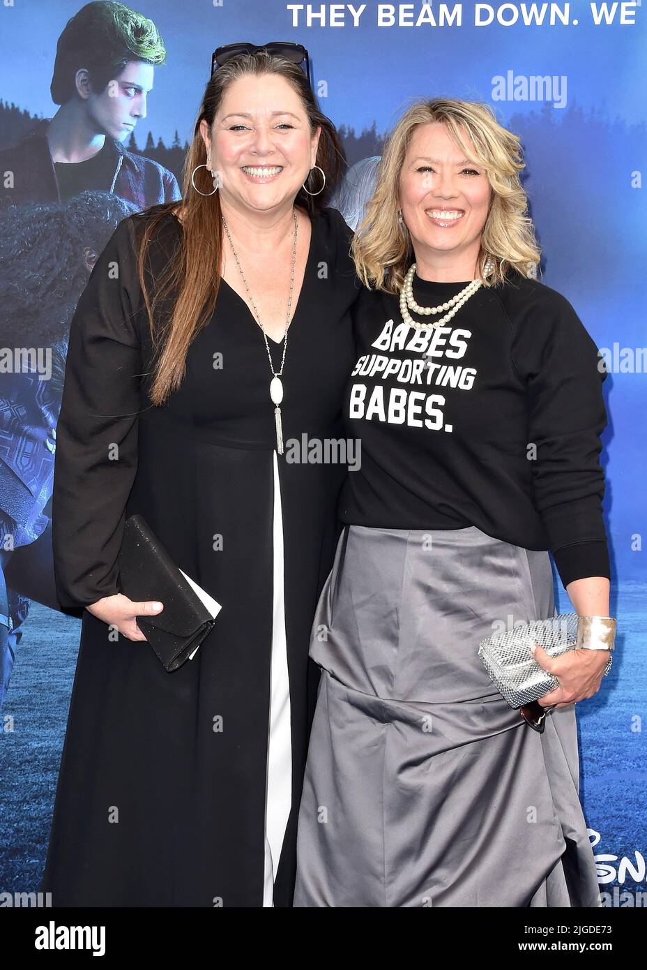 Camryn Manheim and Naomi Snieckus walking on the red carpet at the