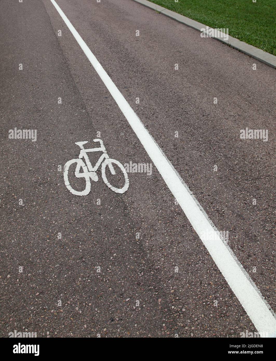 a bike lane on a empty tarred road Stock Photo