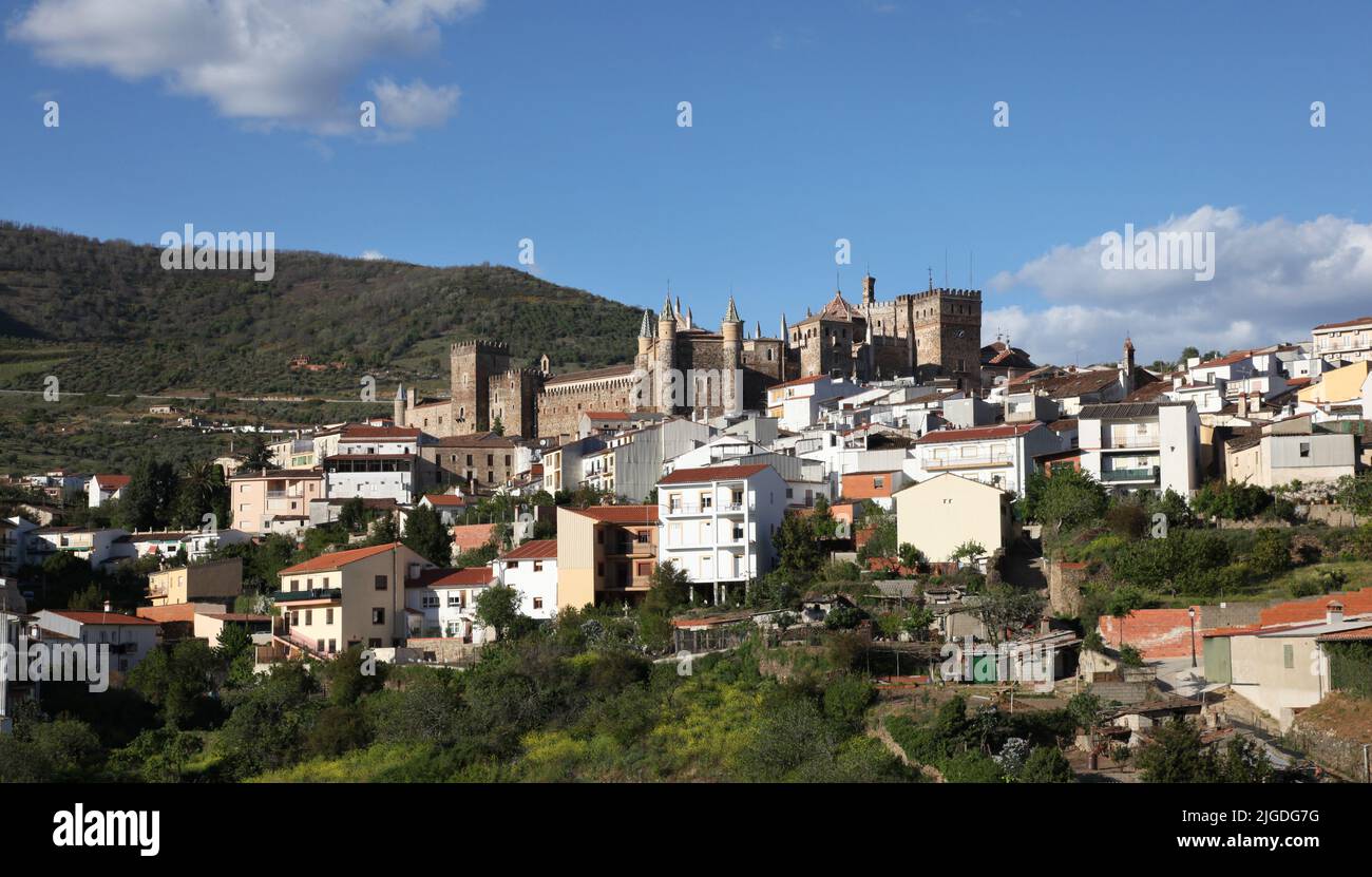 View of Guadalupe town and the historic 'Real Monasterio De Santa Maria' in Guadalupe Extremedura Spain. This monastery is a UNESCO world heritage sit Stock Photo
