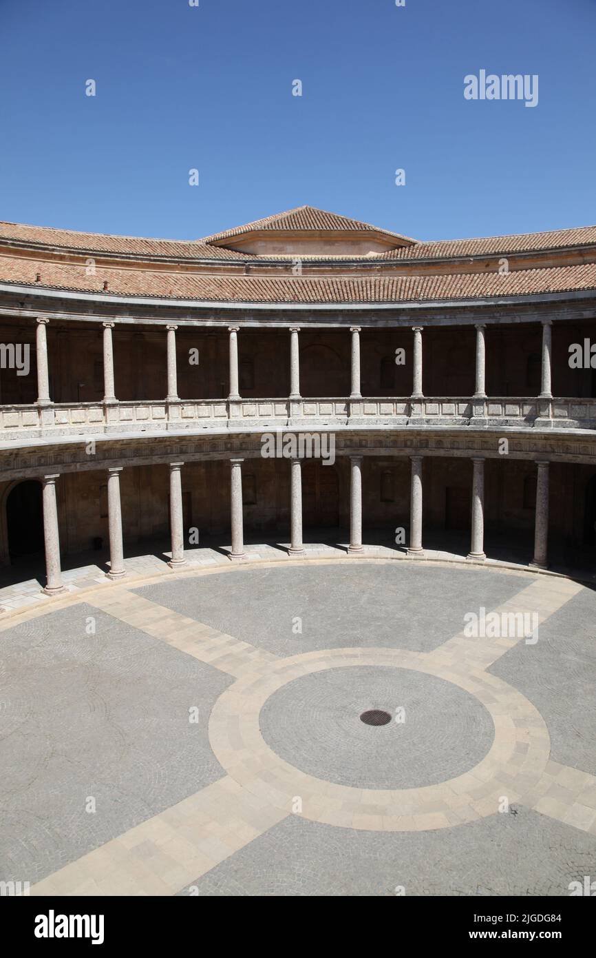 Palace of Charles V - The circular patio of the Palace constructed which started construction in 1533 and was designed by Pedro Machuca Stock Photo