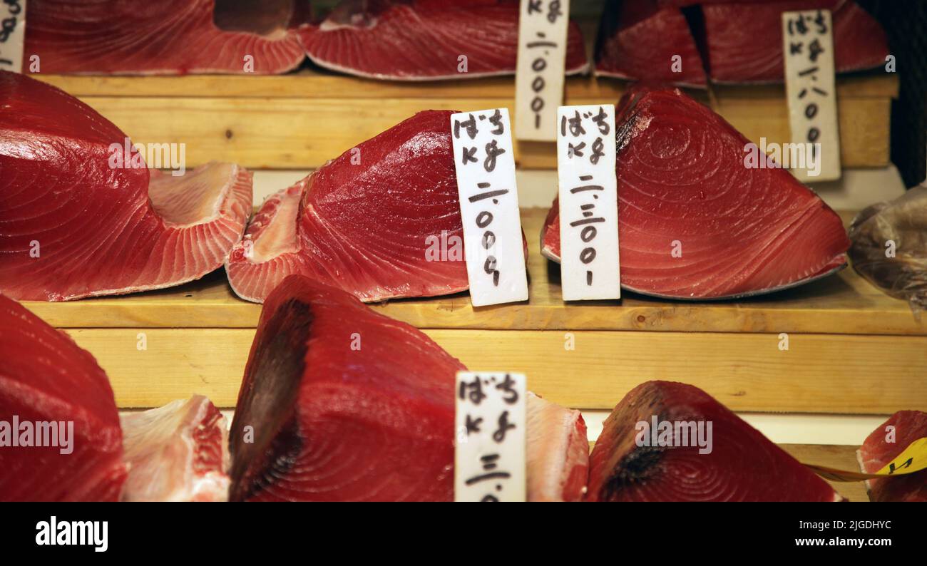 Slabs of freshly sliced tuna in a Tokyo Fish market. Tuna is well sought after seafood in Japan Stock Photo