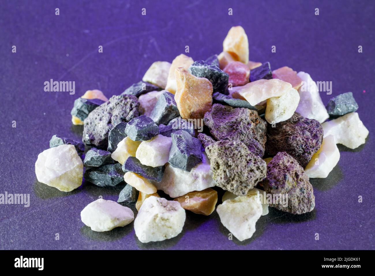 Granites are coarsely crystalline plutonic rocks rich in quartz and feldspar, but also contain