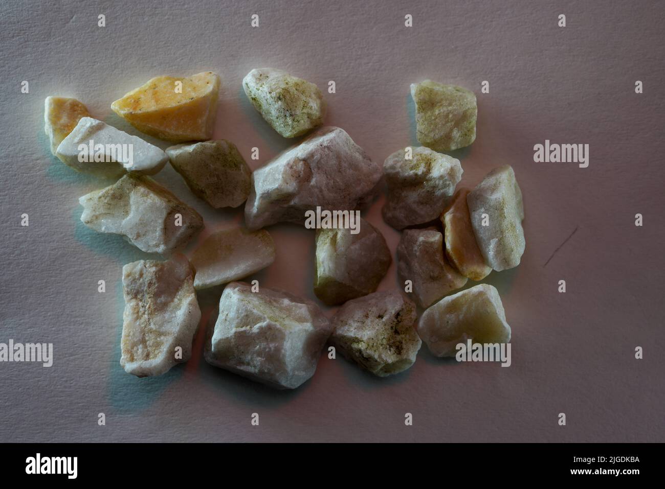 Granites are coarsely crystalline plutonic rocks rich in quartz and feldspar, but also contain