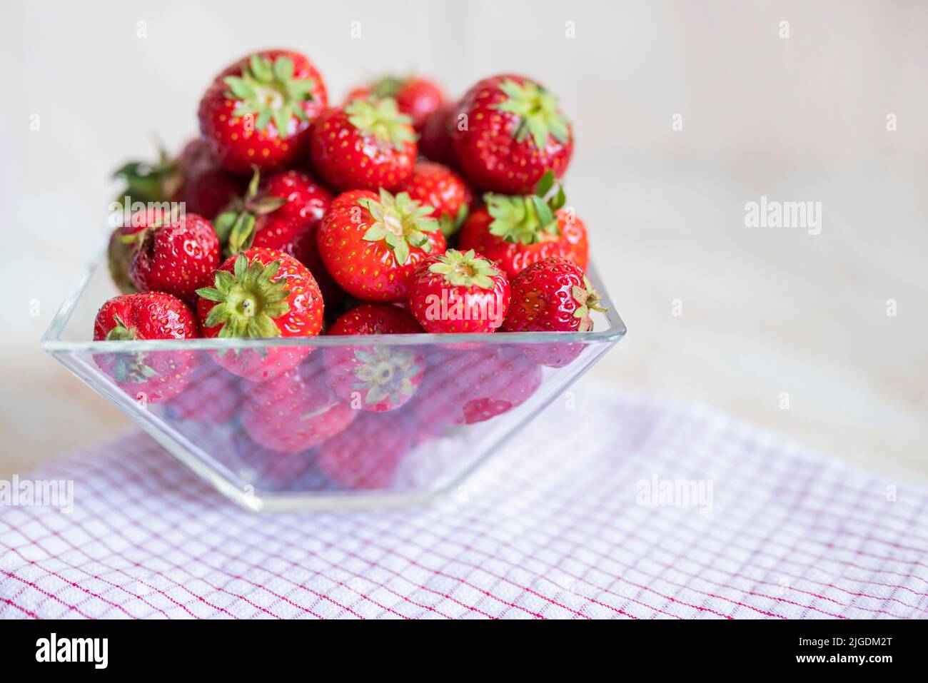 fresh tasty strawberries in a glass bowl Stock Photo - Alamy