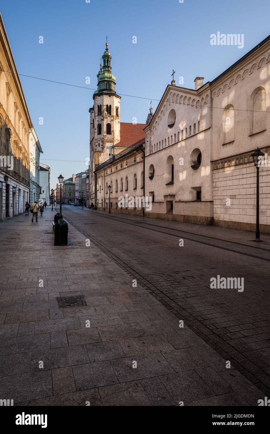 City of Krakow in Poland, cobbled Grodzka Street with Order of St. Clare Monastery and Church of Saint Andrew the Apostle. Stock Photo
