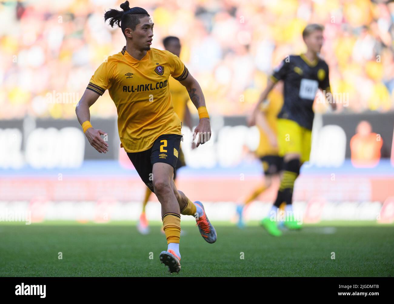 Dresden, Germany. 23rd July, 2022. Soccer: 3rd league, SG Dynamo Dresden - TSV  1860 Munich, Matchday 1, Rudolf-Harbig-Stadion. Dynamo's Tim Knipping  (l-r), Kyu-hyun Park, Dennis Borkowski and Manuel Schäffler cheer. Credit:  Robert