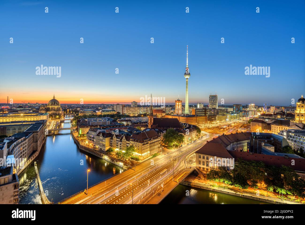 Downtown Berlin at twilight with the TV Tower, the river Spree and the cathedral Stock Photo