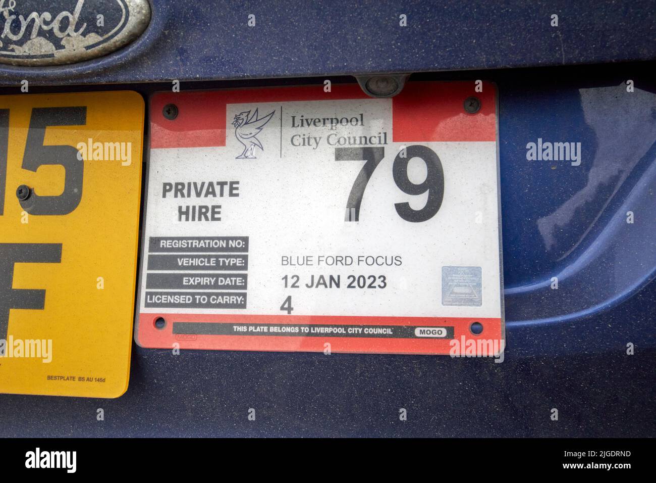 liverpool city council private hire taxi license plate Stock Photo