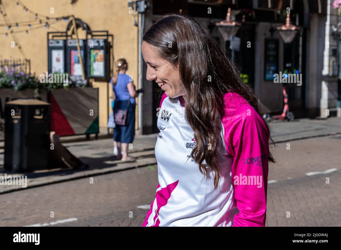 Northampton 10th July 2022. Commonwealth Games Queen’s Baton Relay going through the town centre with Olympic badminton player Chloe Birch waiting to  receive the baton while on it’s way to the The Birmingham 2022 Commonwealth Games.  Credit: Keith J Smith./Alamy Live News. Stock Photo