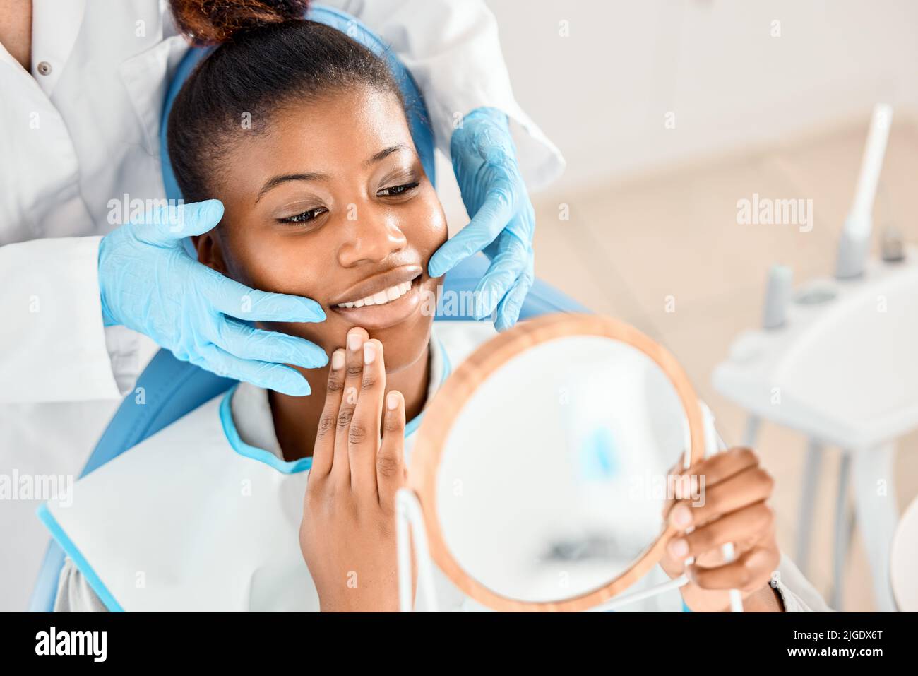 Bedside manner matters during procedures. a patient checking her dental