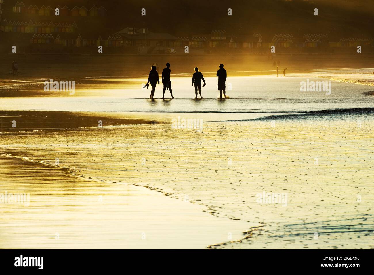 Scarborough, North Yorkshire, UK. 9th Jul 2022. People soak up the late evening sun on North Bay beach at Scarborough, North Yorkshire. Neil Squires/Alamy Live News Stock Photo
