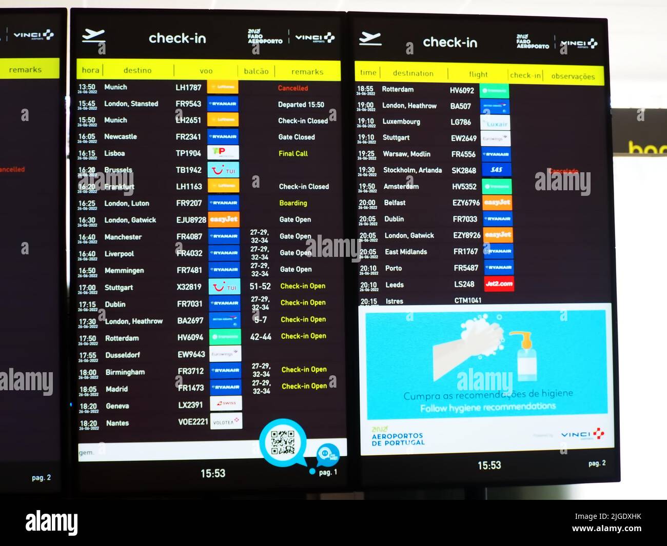 Flight information board at Faro airport Stock Photo