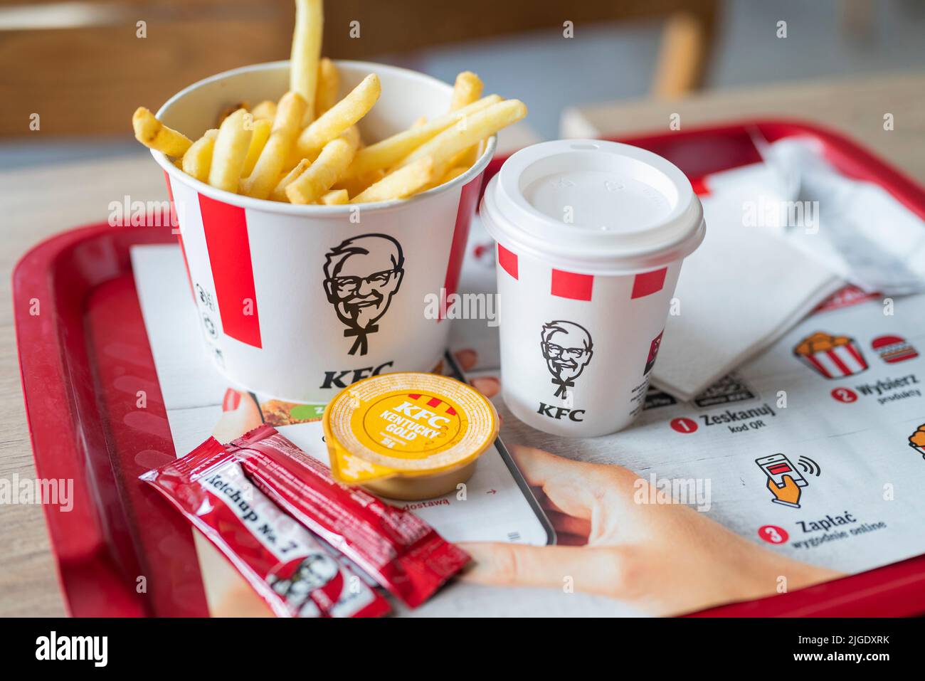 Wroclaw Poland, December 4, 2020. fast food menu french fries with sauce and coffee in KFC restaurant Stock Photo