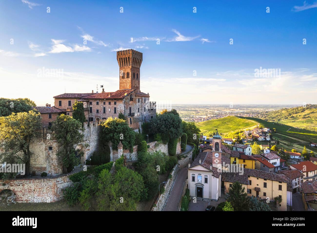 Aerial view of Cigognola Castle with his vineyard in background, Oltrepo Pavese, Pavia, Lombardy, Italy Stock Photo