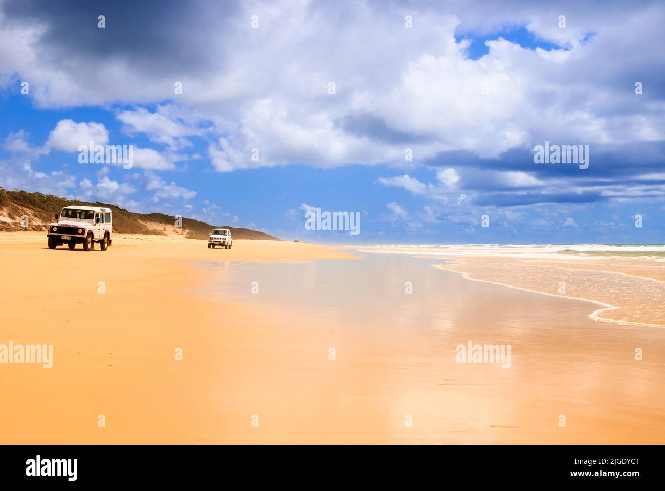 Four wheels drive on the beach of Fraser Island - Queensland, Australia Stock Photo
