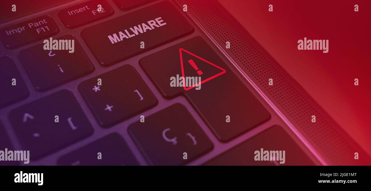 Banner of malware warning keyboard. Cyber security data protection business technology. Stock Photo