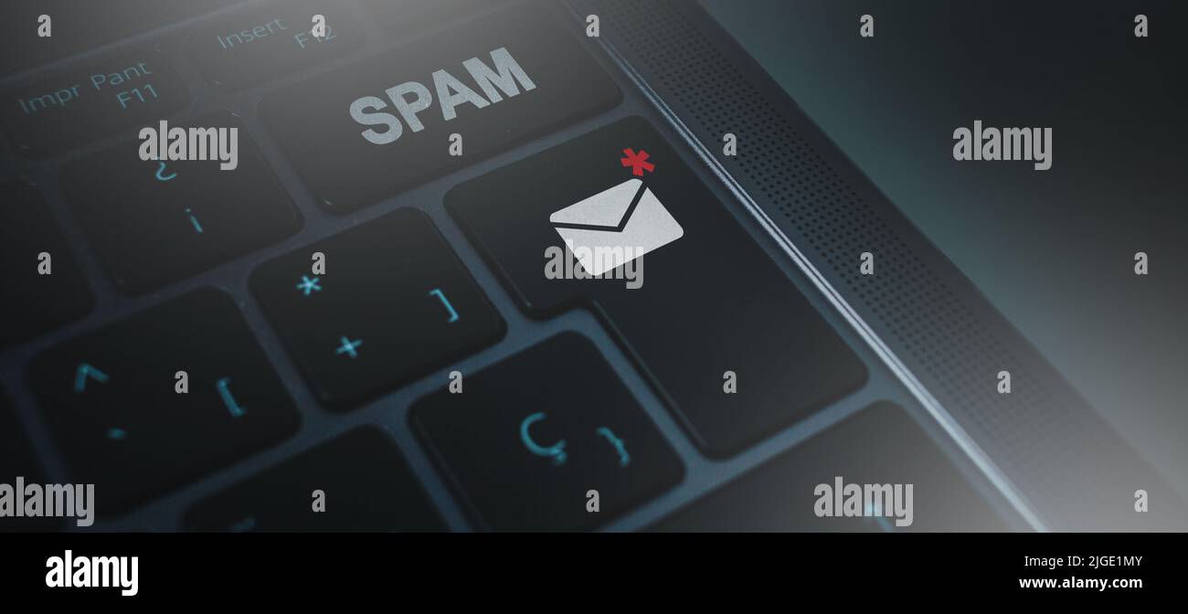 Banner of keyboard with mail spam button concept. Communication business technology. Protect spam mail from internet cyber security. Stock Photo
