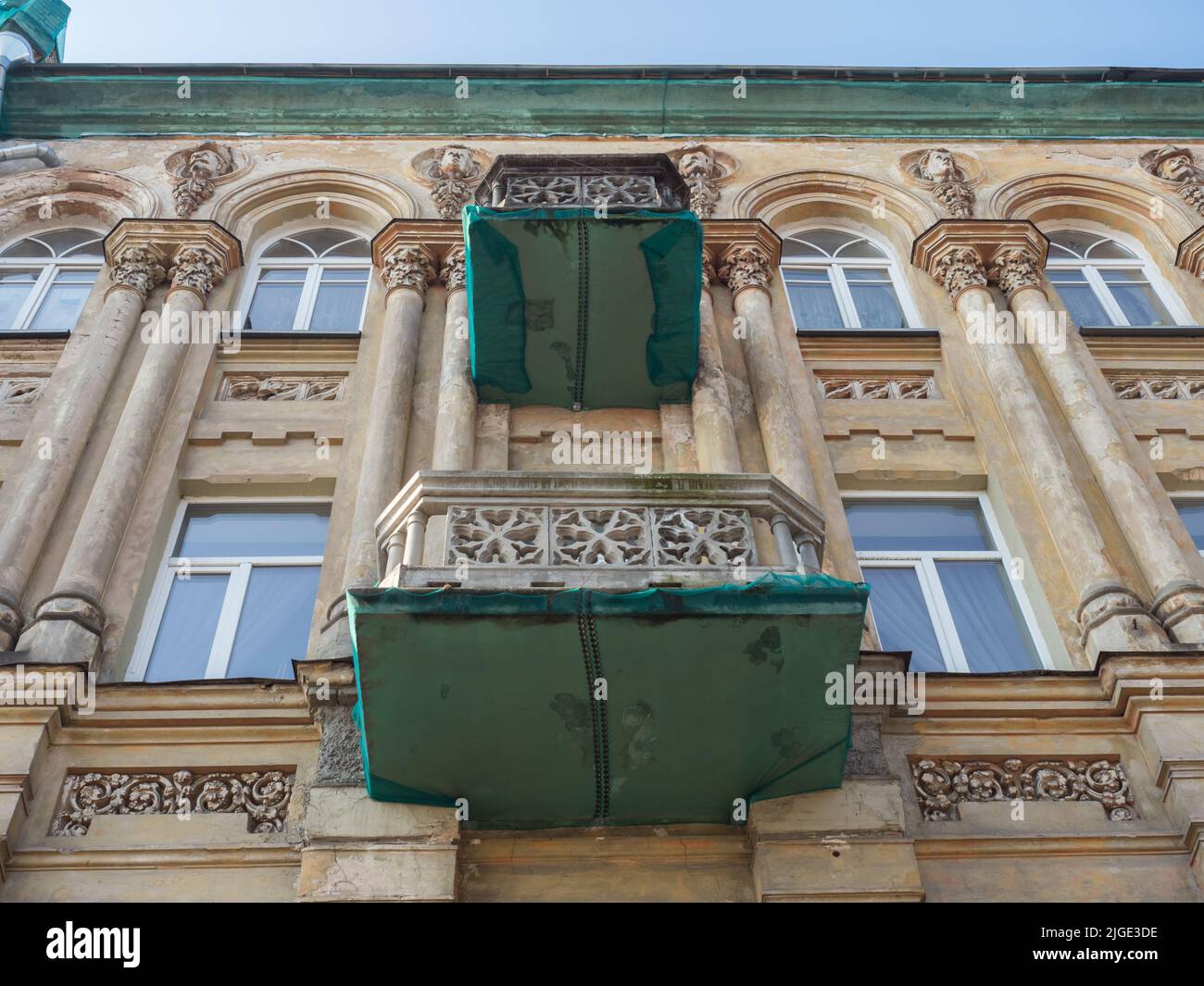 Vilnius, Lithuania - April 2018: Historic tenements along the street in Vilnius. East Europe Stock Photo