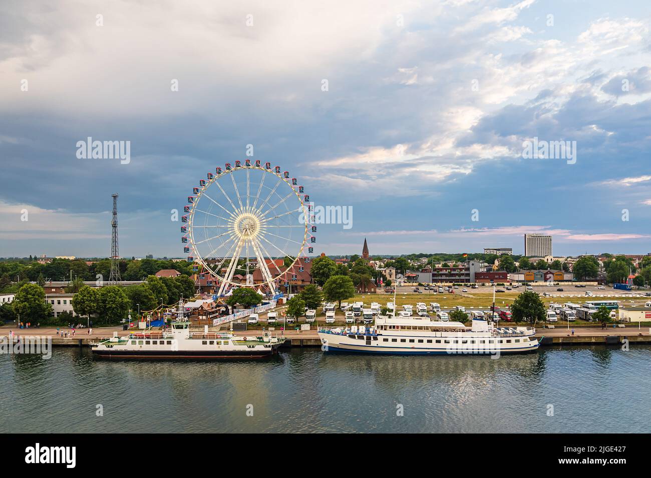 Ferris wheel on the Baltic Sea coast in Warnemuende, Germany. Stock Photo