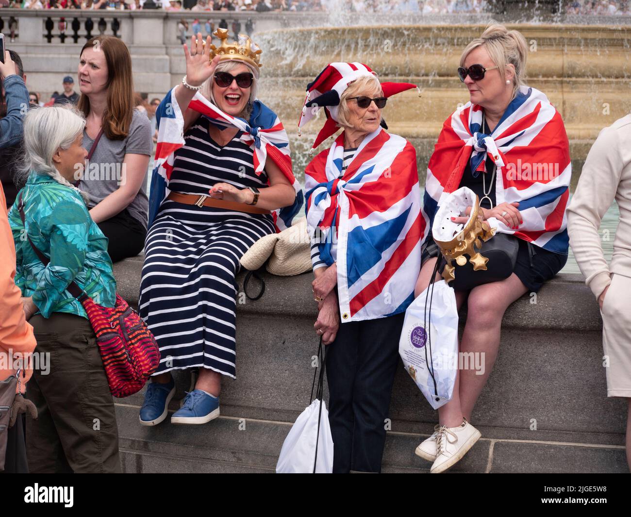 Revellers in Trafalgar Square during The Queen's Platinum Jubilee 2022 Stock Photo
